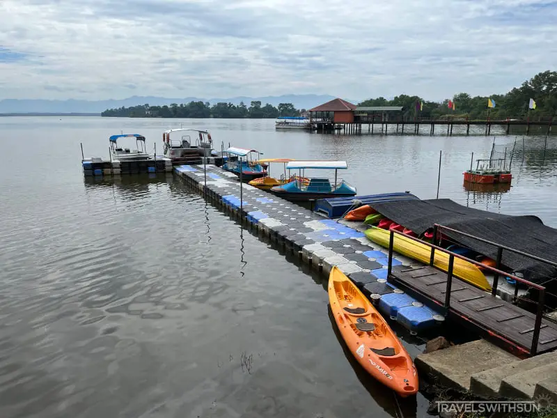 Boats And Kayaks Docked At The Lake In Bukit Merah Laketown Resort