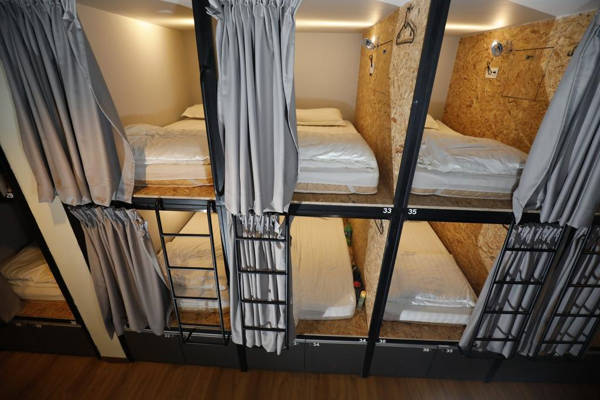 Capsule style beds at the Sleepbox Hotel
