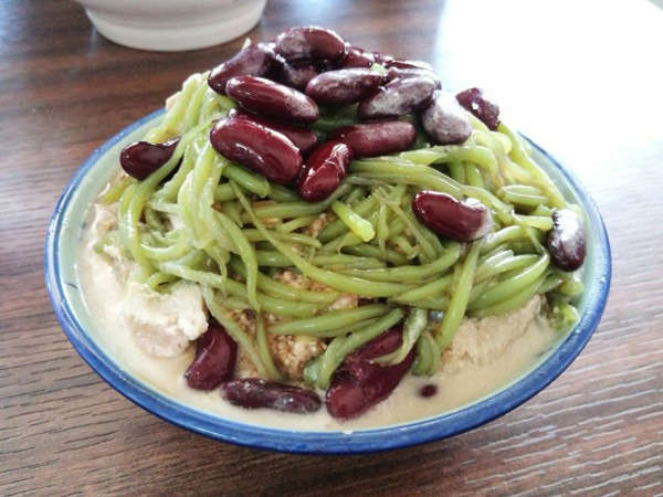 Cendol is common Malaysian dessert with shaved ice, sugar, red beans, green jellies and coconut milk