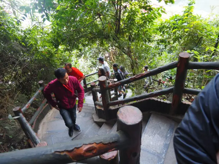 Climbing up the stairs to Sung Sot cave