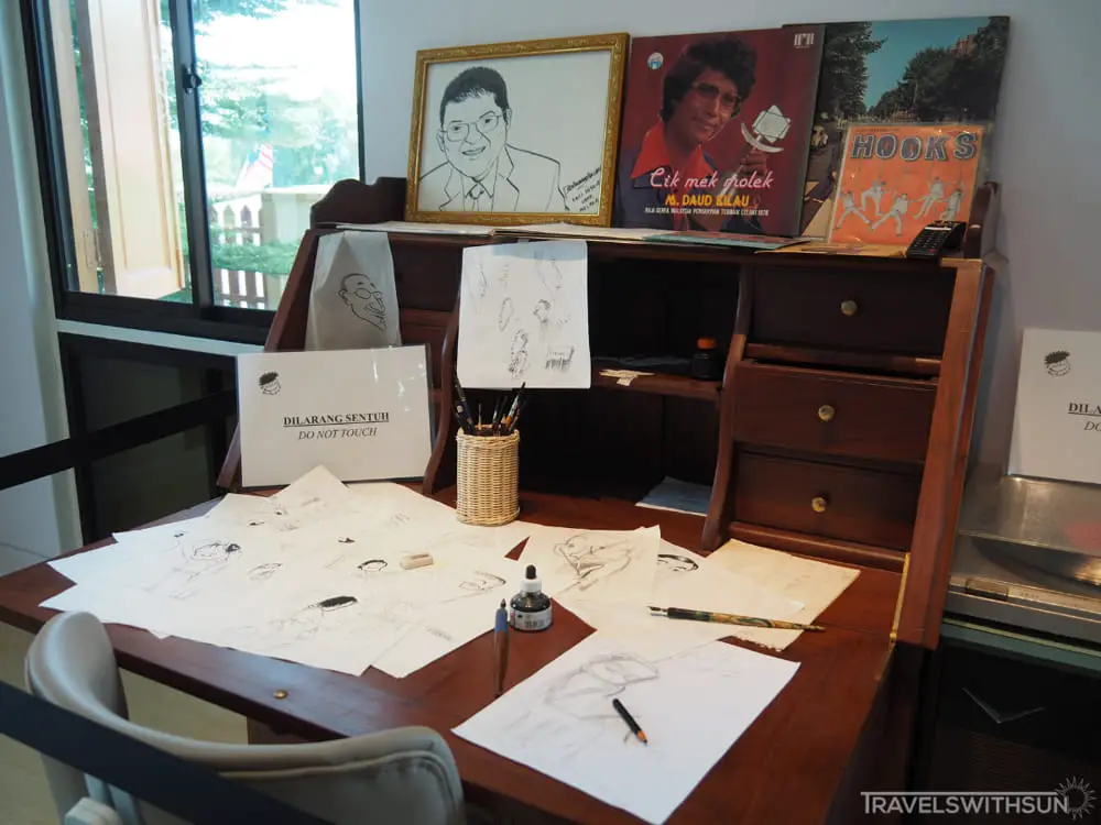 Desk And Sketches At Lat House Gallery In Batu Gajah