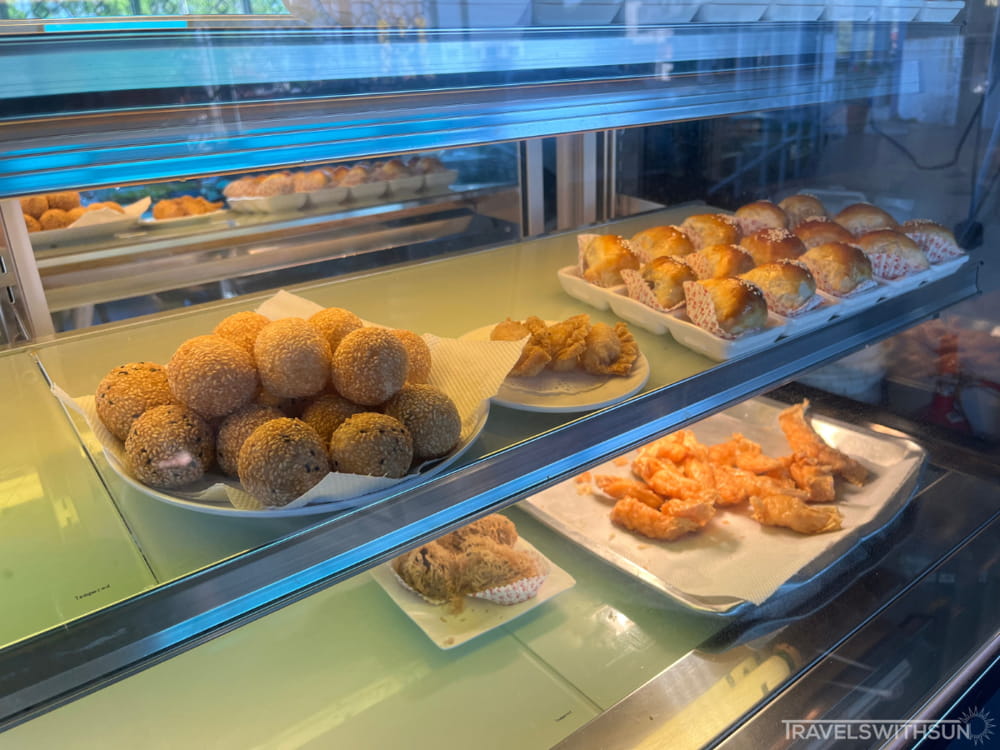 Fried Dim Sum And Pastries In A Display Case At The Front Of Dimsum Paradise