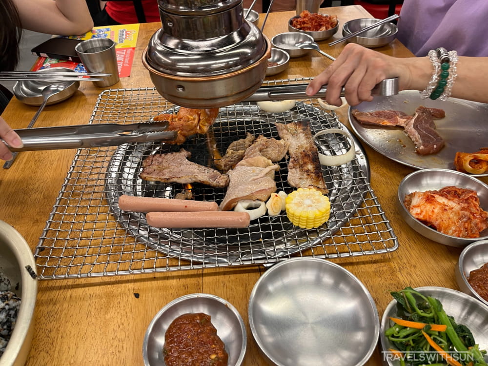 Grilling Meat At Our Table In Sae Ma Eul BBQ Ipoh
