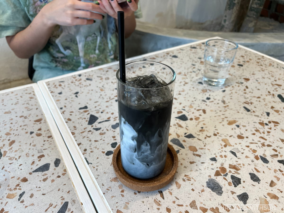 Iced Charcoal Latte At Signature 49 Cafe