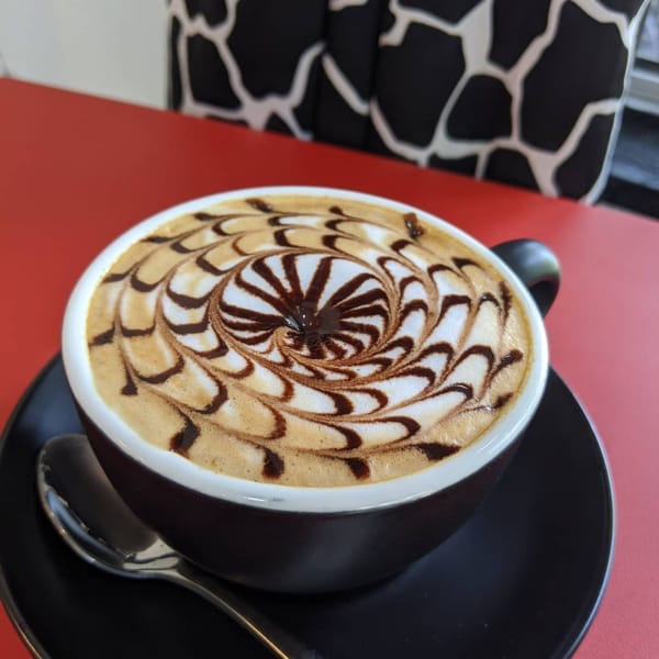 Intricate Coffee Art By CoffeeNuts Cafe