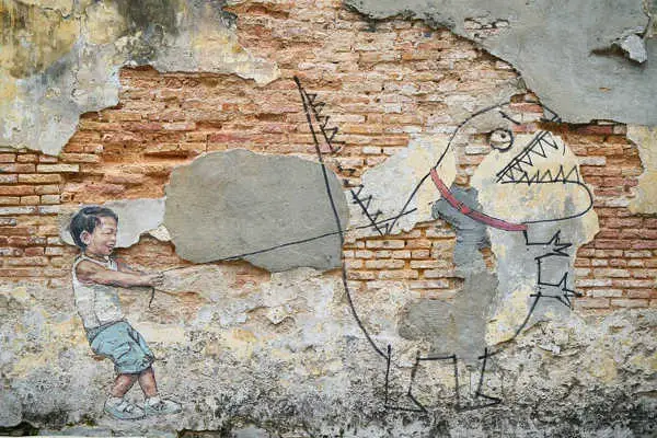 Little Boy With Pet Dinosaur - A Penang Street Art Painting By Ernest Zacharevic