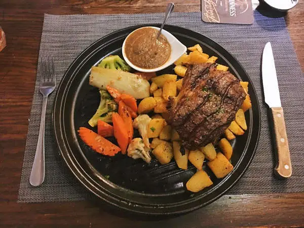 Medium Rare Ribeye Steak By Il Bacaro Restaurant