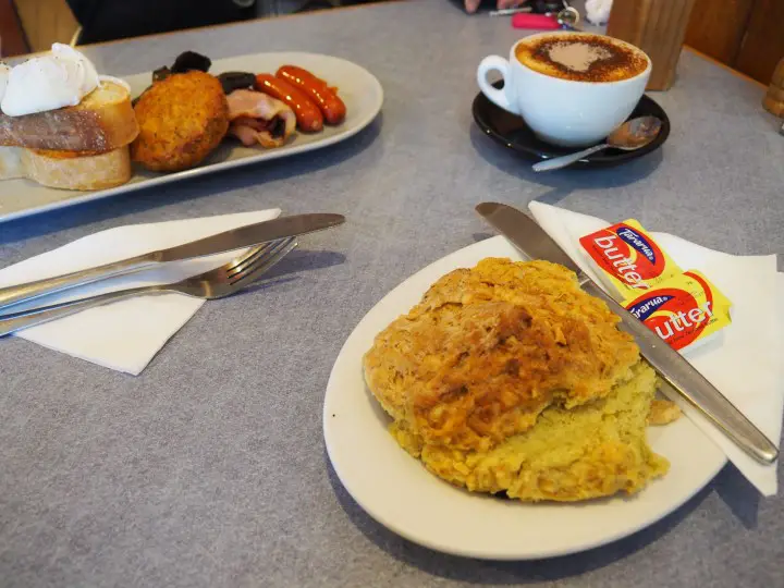 Pesto scone and big breakfast at Ti Tree Cafe in Waihi Town, Coromandel Peninsula - more on www.travelswithsun.com