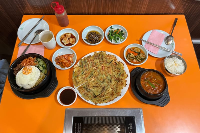 Side Dishes, Korean Pancake, Bibimbap And Kimchi Tofu Stew At Da Ohn Da Korean BBQ