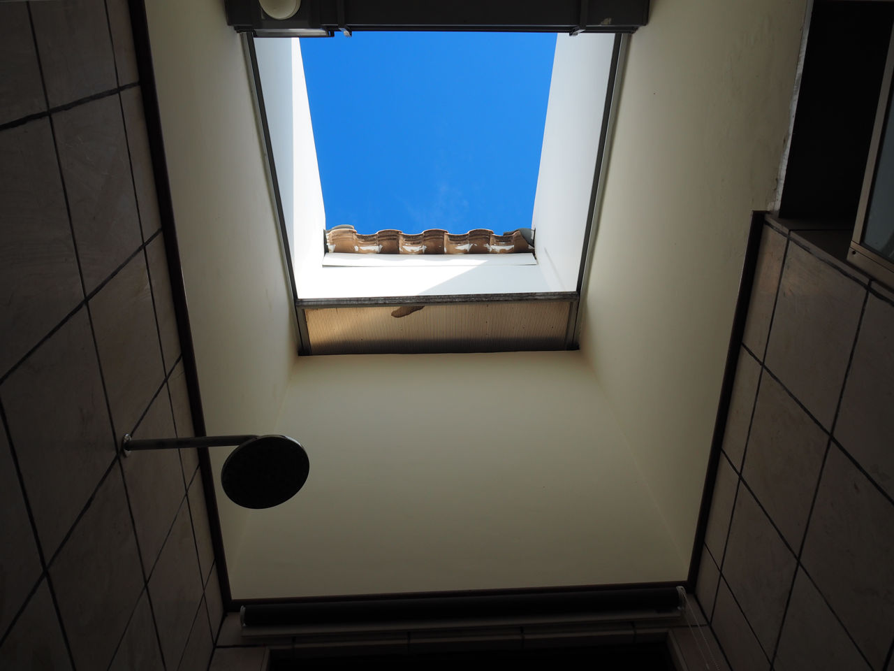 Skylight in the shower room of the chalet in Port Dickson