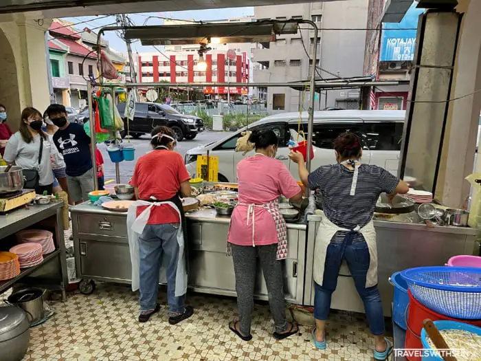 Staff Preparing Chicken At Cowan Street Ayam Tauge And Koitiau Restaurant