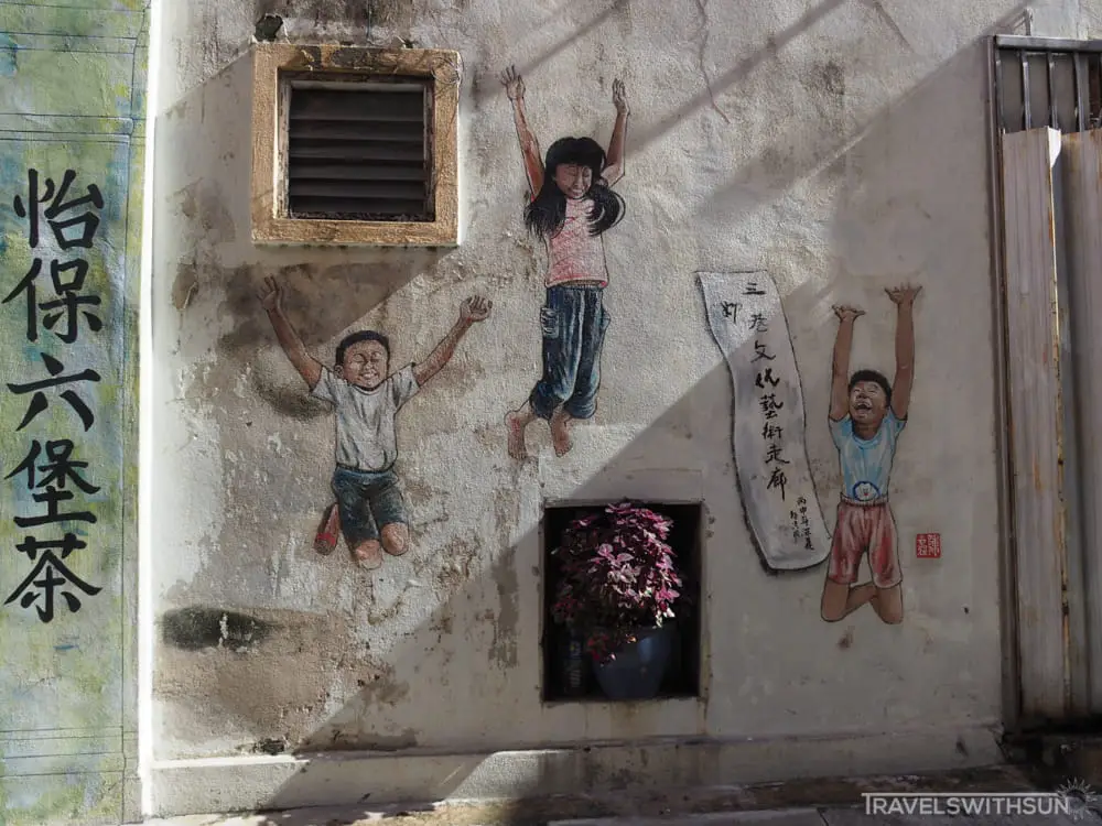 Wall Mural Of Kids Jumping For Joy At Market Lane In Ipoh Old Town