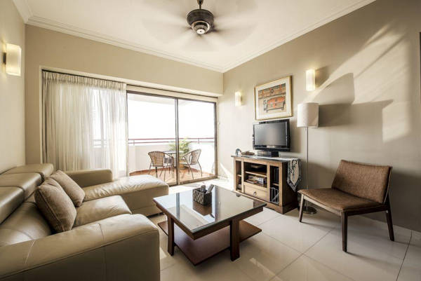 Well Furnished Living Room And Spacious Balcony At Susie VIP Suites